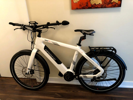 Revelo THINstem for electric bikes; a secure storage and charging solution by rotating the handlebar (quick release handle bars).